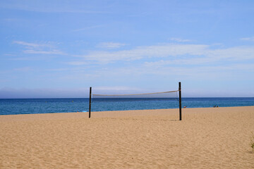 beach volleyball court and net on the beach in front of the sea, sport, activity, fitness, holiday, vacation