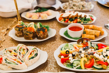 cold meats, vegetable salads, fruit salads Preparation of dishes for an all-inclusive banquet in a resort hotel. Empty all inclusive line, restaurant equipment