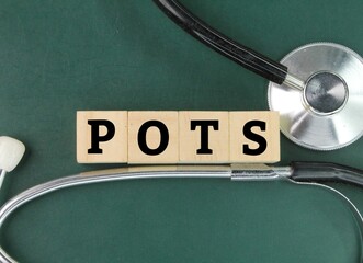 stethoscope and the letters POTS or the word Postural Orthostatic Tachycardia Syndrome. symptoms...