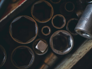 Heavy screw grungy rusted wrenches dirty screwdriver object. Industrial hardware set. Mechanic tools engineering equipment car auto repair shop with copy space. Blurred background mechanical service