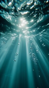 sunlight shining surface blue depths depravity engine underslung jaw deep searchlight rays diffused