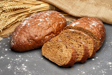 Freshly baked rye bread with a rustic crust, perfect for sandwiches or as a side