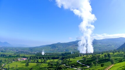 Amazing view of tea plantations and smoke coming out of Wayang Windu crater Pangalengan Bandung