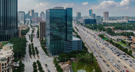 Cityscape buildings of Westside in Uptown Houston and Insterstate 610 Freeway, Texas, United States...