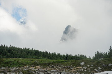 Fototapeta premium Fog Engulfs Mount Rainier and Ridges Below