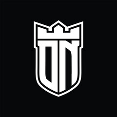 DN Logo shield shape with geometric crown inside white outline on black background template design