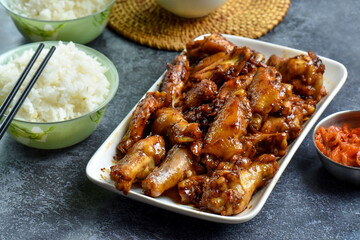 Asian style grilled chicken wings in soy-honey sauce