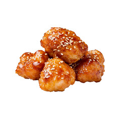 Close up of crispy, glazed chicken bites with sesame seeds