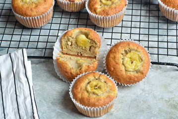 Airy banana muffins on a gray background