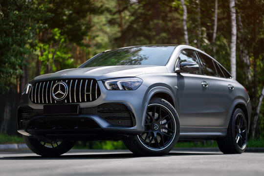 Novosibirsk, Russia -  july   05, 2024: silver Mercedes-Benz GLE Coupe AMG 53 4Matic+ parked on the   street  on a warm summer day