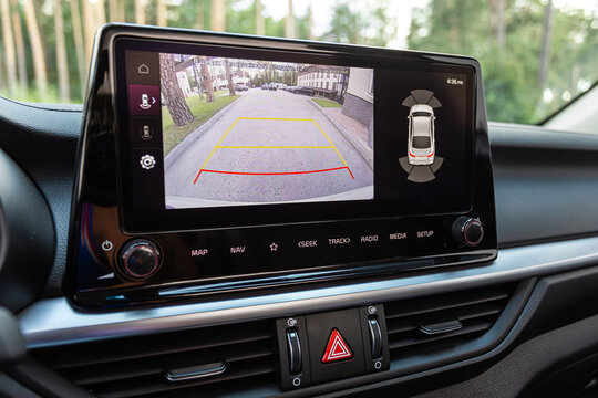 Novosibirsk, Russia -  August 10, 2024:  Kia K3, reverse camera with monitor,buttons - details and controls of modern car.