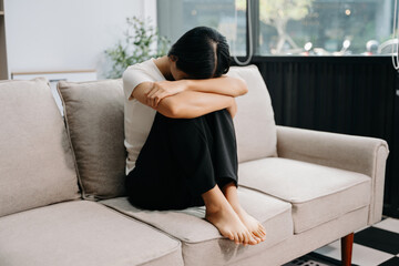 Obraz premium woman sit Depression Standing by window and anxiety Copy space. .