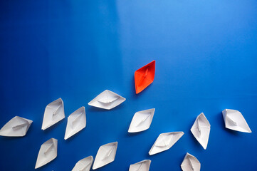 White Paper Boats In Mess Formation While One Ship Breaks The Formation Looking Another Way....