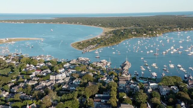 An aerial tilting shot of boats in the harbor in Edgardtown, Martha's Vineyard, Massachusetts
