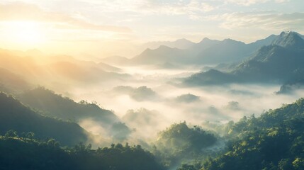 Fototapeta premium Sunrise Over Misty Mountain Ranges