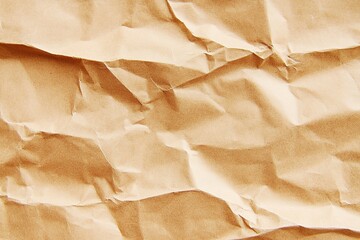 Abstract crumpled and creased recycle brown paper texture background 