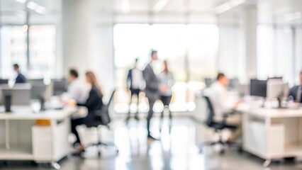 Out of Focus Business Setting - Abstract blur of a business setting with people and office equipment.
