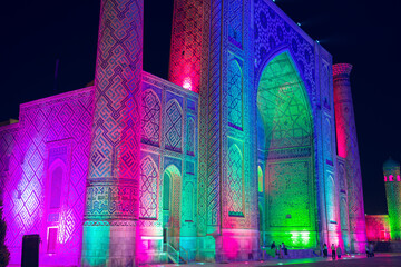 Light show on the facades of the madrasahs of Registan Square.