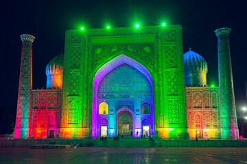Light show on the facades of the madrasahs of Registan Square.
