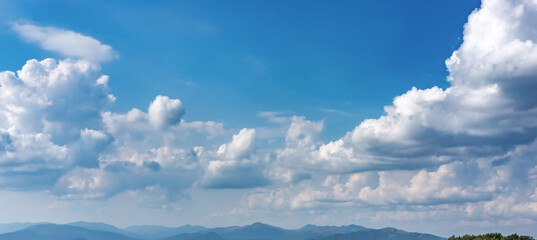 Beautiful cloudy sky with cumulus clouds. Natural sky texture