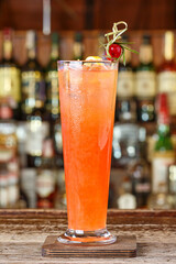 Strawberry cocktail in a glass with ice