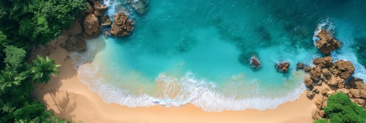 Aerial View of Vibrant Tropical Beach With White Sand, Clear Blue Waves and Lush Greenery