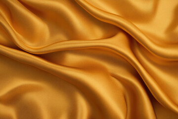 Fototapeta premium Luxurious golden satin fabric, rich shimmering texture, gently flowing folds create an inviting warmth, ideal for elegant drapery or sophisticated attire.