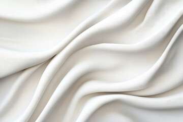 Obraz premium Elegant undulating fabric, soft luxurious texture, subtle sheen reflecting light, creating a serene and tranquil atmosphere, ideal for fashion and interior design applications.