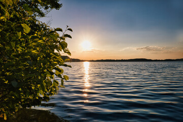 See im Abendrot - Sunset - Landscape - - Beautiful scene over the lake and silhouette hills in the...