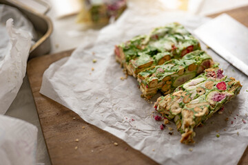 Snowflake Crisp (Milk Nougat Bites)wooden background