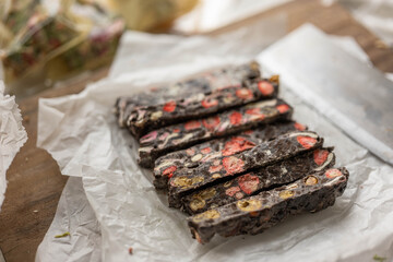 Snowflake Crisp (Milk Nougat Bites)wooden background