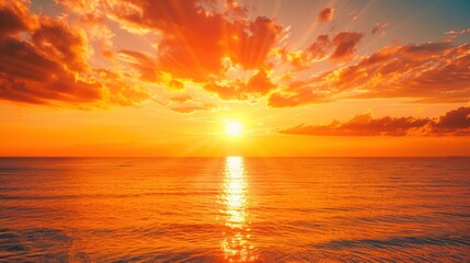 Fototapeta premium Fiery Sunset Over the Ocean