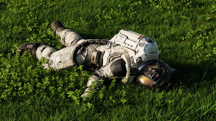 A lone astronaut in a white spacesuit lies face down in a green grass field. 3d render © angel_nt