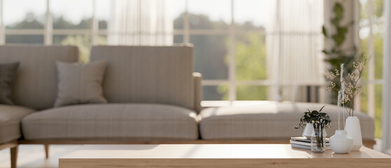 A space for displaying products on a wooden coffee table in a contemporary Scandinavian living room.
