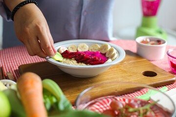 Close Up Of Hand Preparing Making Mix Fruit