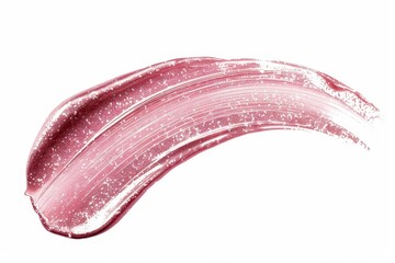 Fototapeta premium A sample of pink shiny lip gloss for makeup isolated on a white background