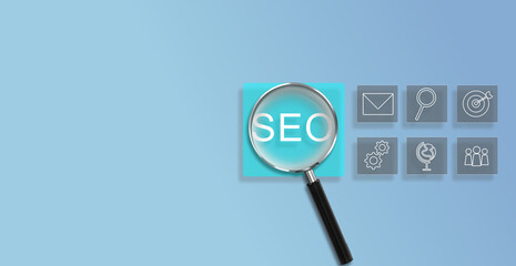 Magnifying glass focus on Search Engine Optimization (SEO) concept. Businessman user laptop to...