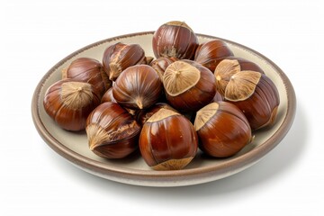 Obraz premium Chestnuts on white plate