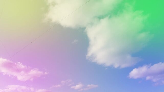 Clouds floating across a colorful sky. Timelapse. Abstract background.