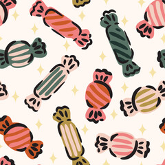 Colorful candy and diamond shaped stars in a christmas color palette of pink, green, cream and beige on an off-white background. Great for homedecor, fabric, wallpaper, giftwrap, stationery,packaging.