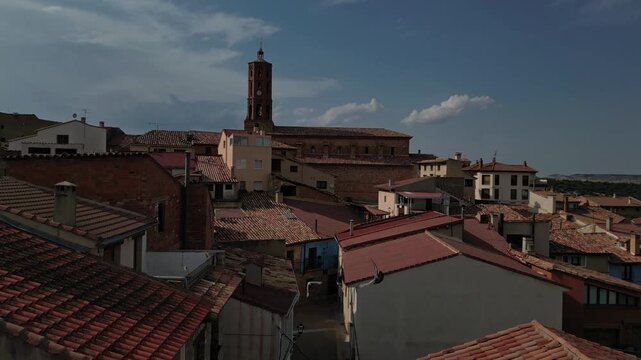 Rooftop view of La Mata de los Olmos, a quaint Spanish village under a bright blue sky