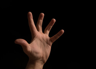 Man hand. Hands. Concept. Photo. Background. Dark. Shadow. Help. Finger. 