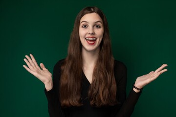 Woman in Black Shirt Holding Hands Out