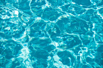 Blue ripped water in swimming pool, water pool texture and surface water backgraund.