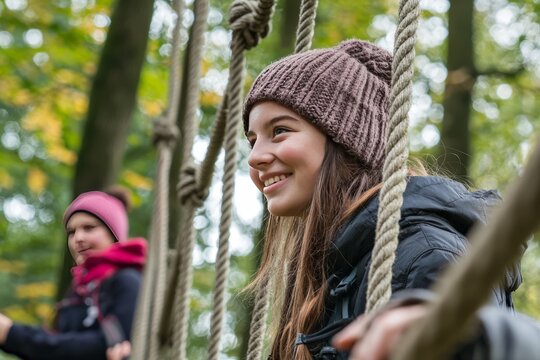 Students engaging in outdoor team-building activities, such as rope courses and group challenges in a nature reserve
