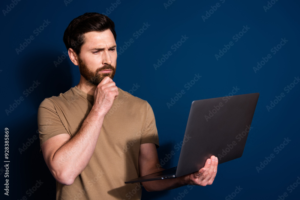 Canvas Prints Photo of mature age senior it specialist programmer brunet man with laptop touch chin minded isolated on dark blue color background