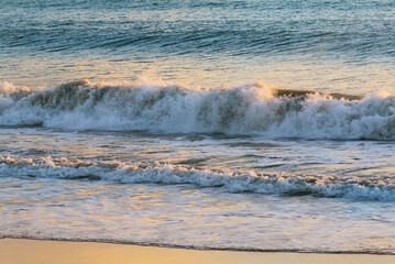 sea background texture with wave and sandy beach