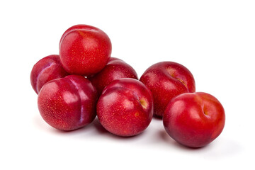 Obraz premium Sweet red plums, isolated on white background.