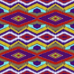  Colorful ikat pattern in vintage style. Elegant ethnic background. Hand drawn oriental art. Seamless geometric vintage texture