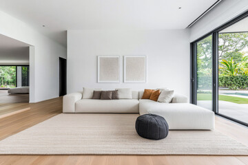 Luxury living room area with minimalist furniture and minimal decor in an interior design composition.